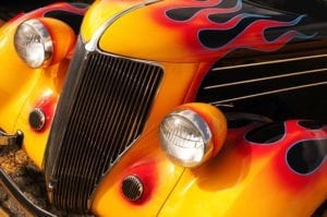 Covina Thunderfest & Music Festival Classic hot rod with red flames on black paint.